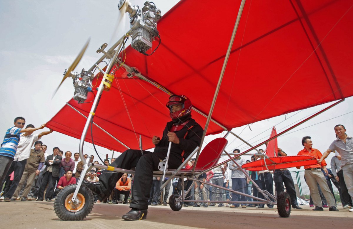 farmer-shu-mansheng-prepares-to-take-off-with-his-homemade-ultralight-aircraft-in-wuhan-hubei-province-may-10-2010
