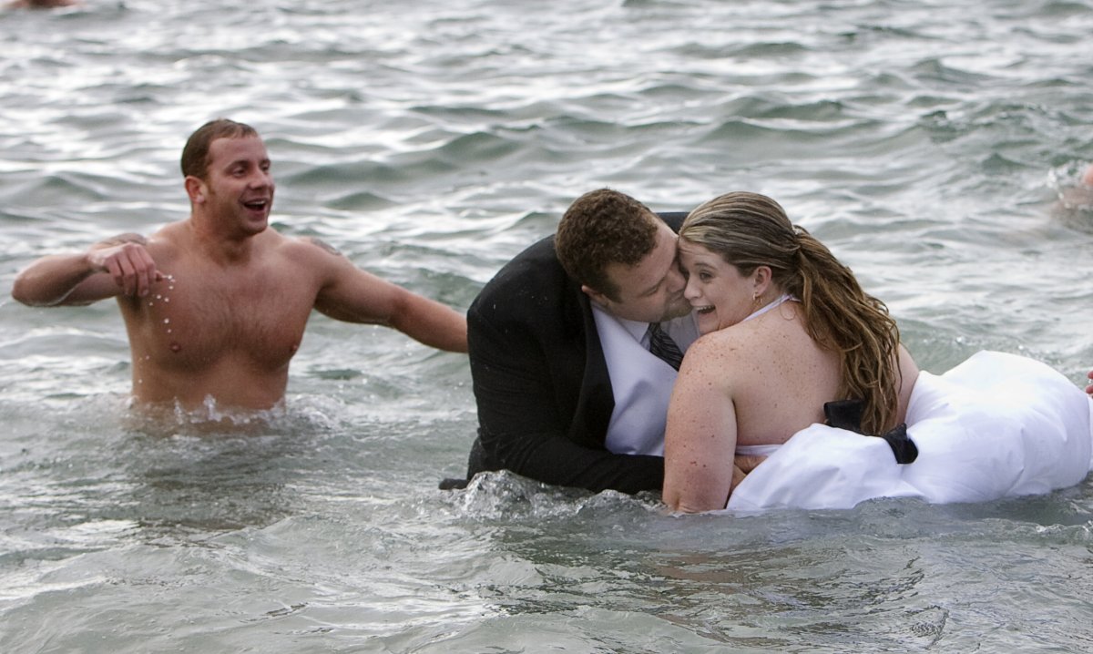 gerhard-pyper-and-his-wife-jan-stand-in-the-english-bay-after-taking-part-in-the-89th-annual-polar-bear-swim-in-vancouver-british-columbia