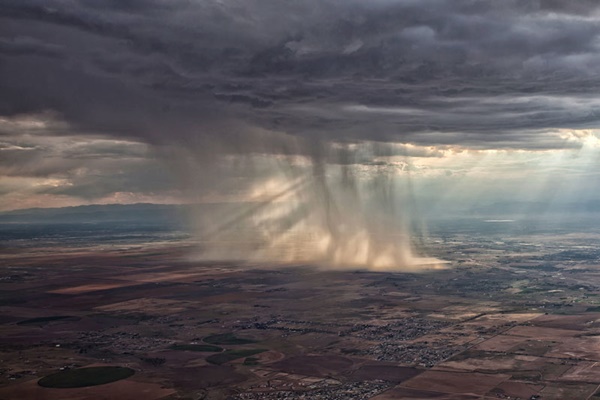distant-storm-cloud-seen-from-airplane-window-10