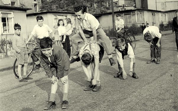 Street Leap-Frog...17th October 1955, A group of boys playing leap-frog in the street, watched by their friends. (Photo by John Drysdale/Keystone Features/Getty Images)