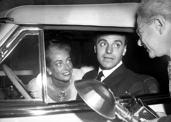 Arriving at CiroÕs with Crawford in one of the Cadillacs she gave him. (June 4, 1948)