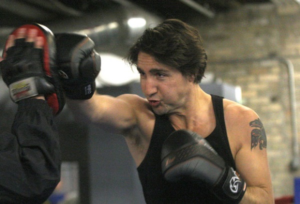 Federal Liberal leadership candidate Justin Trudeau  atPan Am Boxing Club with owner Harry Black during his boxing work out session at the– He will take place in a leadership candidate debate at 1 p.m. at the Metropolitan Theatre in Winnipeg Saturday afternoon.- February 01, 2013   (JOE BRYKSA / WINNIPEG FREE PRESS)