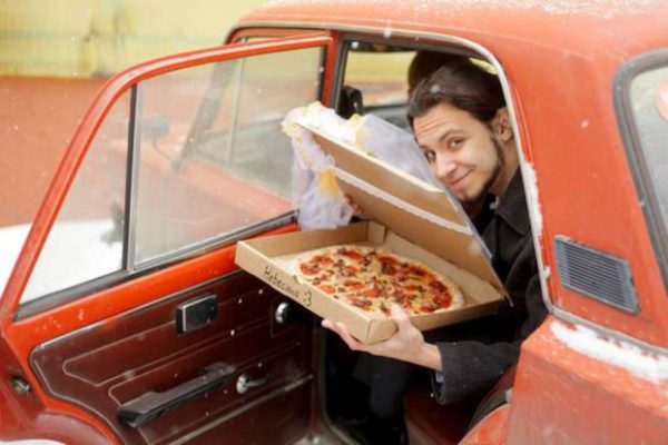 Pic shows: 22-year-old Russian marries a pizza.nnA lonely Russian gourmet fed up of not having a better half has married a pizza.nnThe bizarre wedding ceremony took place in a pizzeria in the city of Tomsk, in the Tomsk Oblast region that is located in south-central Russia.nnThe man who was not named said he came up with the idea because she was fed up of being alone.nnHe said: "At some point I realized that half of my friends are complaining about their better half, while the others were complaining about the lack of a better half."nn"Love between two humans is a complicated wild thing. I was grateful that I had at least my love of food and then it came to me that actually love for food remains stable no matter what."nn"Pizza would not reject you or betray you, and speaking quite frankly and sincerely, I love it."nnSceptical Russian authorities refused to give official permission to register the unusual marriage at a registry office, and the church also turned him down.nnSo in the end the unusual ceremony went ahead in one of the city¿s pizzerias. Managers and cooks at the restaurant even went as far as to provide the man with a certificate of marriage, and the pizza bride was covered in a bridal veil.nnAfter that the happy groom posed in front of many cameras with his "wife". Details of what they did on their honeymoon night together were not revealed.nn(ends)