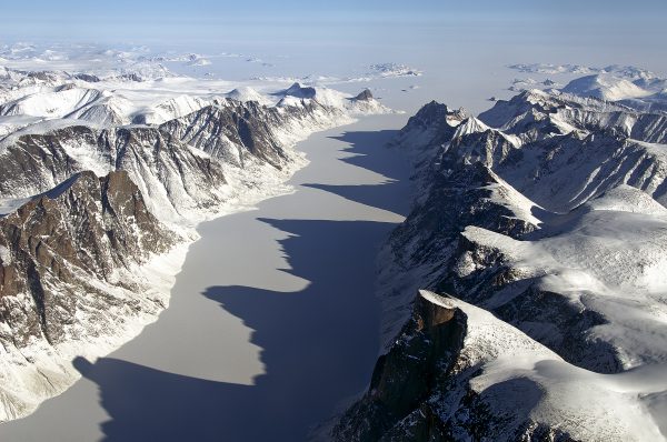 Ice covered fjord on Baffin Island with Davis Strait in the back.