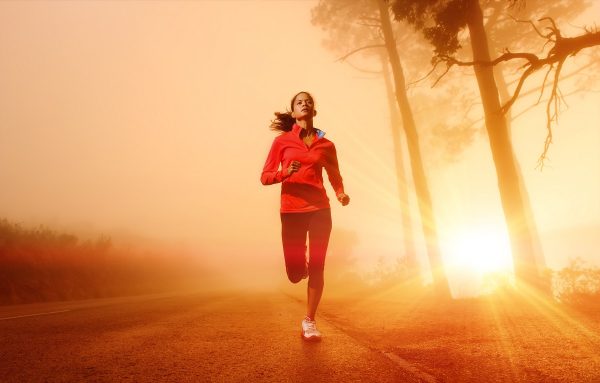 Sunrise running woman