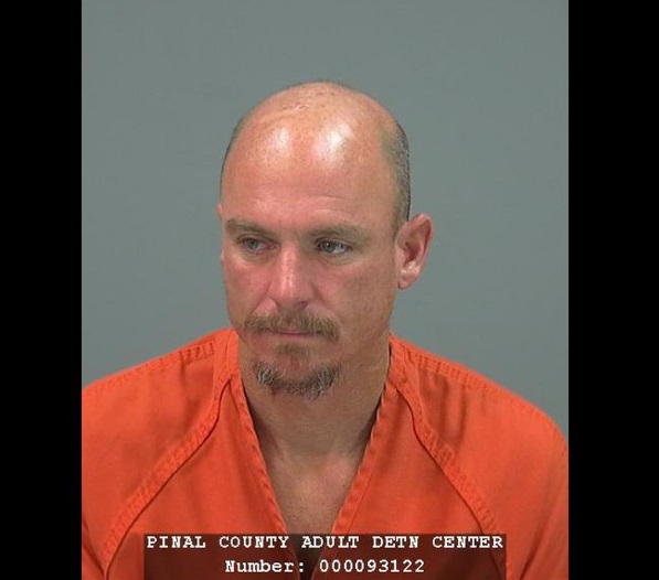 This image provided by the Pinal County Sheriff's office shows the booking photo of Joseph Andrew Dekenipp an inmate of the Pinal County Adult Detention Center who escaped by climbing two walls and crawling through razor wire and was reportedly meeting his sweetheart on Valentine's Day. He was arrested in the town of Coolidge, a few hours after he escaped Friday Feb. 14, 2014. (AP Photo/Pinal County Sheriff)