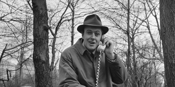 Roald Dahl answers a telephone while filming an episode of the science fiction show "Way Out" in Central Park, New York, March 25, 1961. (Photo by CBS Photo Archive/Getty Images)