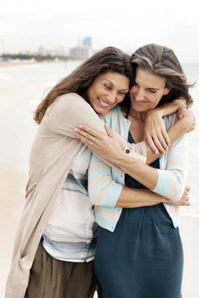 women-hugging