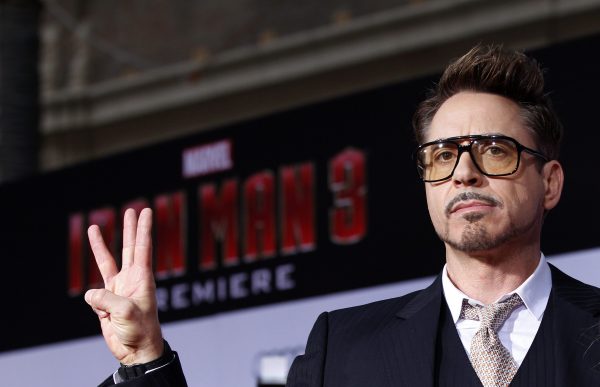 File photo of cast member Robert Downey Jr. posing at the premiere of "Iron Man 3" in Hollywood
