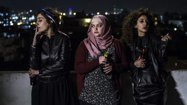 Salma (Sana Jammelieh), Nur (Shaden Kanboura) and Laila (Mouna Hawa) share a quiet moment In Between.
